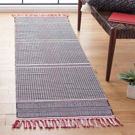 Safavieh Montauk 2'-3" x 7'-0" Rug in Red / Multi