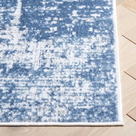 Safavieh Amelia 700 5'-3" x 7'-6" Rug in Ivory / Steel Blue