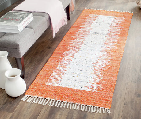 Safavieh Montauk 2'-3" x 6'-0" Rug in Ivory / Orange