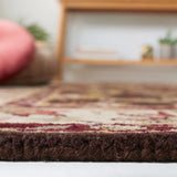 Safavieh Heritage 4'-0" x 6'-0" Rug in Brown / Beige