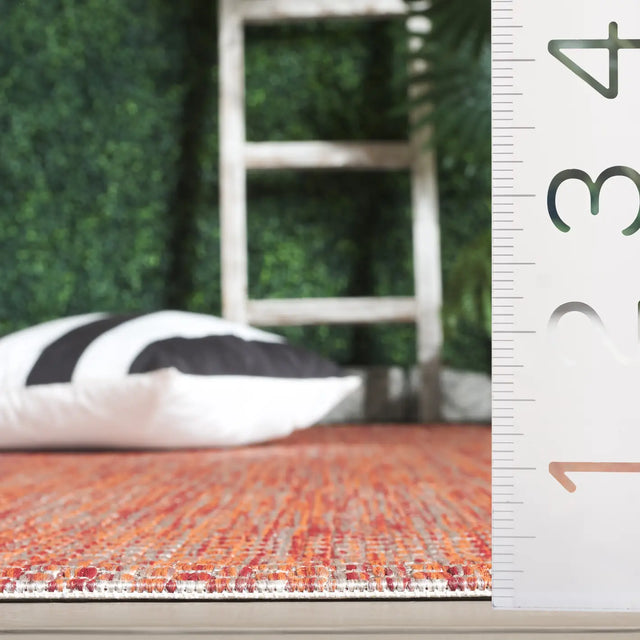 Safavieh Courtyard 5'-3" x 7'-7" Rug in Red / Beige