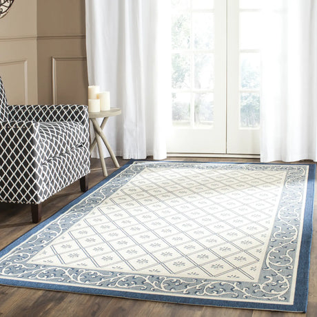 Safavieh Courtyard 4'-0" x 5'-7" Rug in Beige / Navy