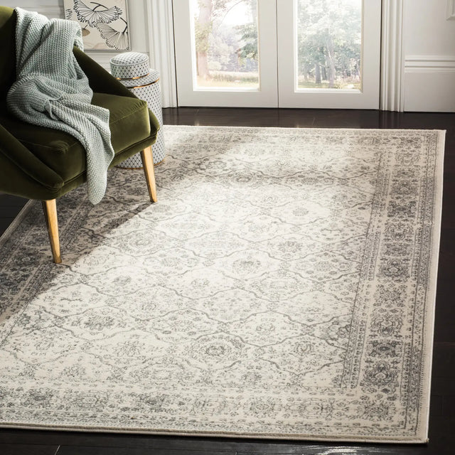 Safavieh Carnegie 5'-1" x 7'-6" Rug in Cream / Dark Grey