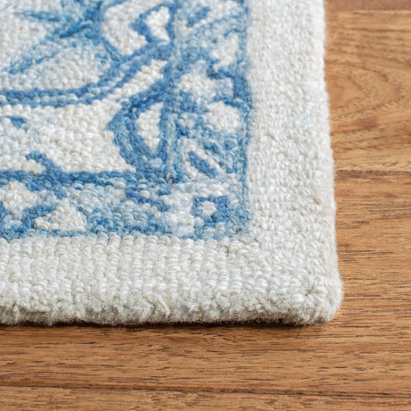 Safavieh Micro-Loop 4'-0" x 6'-0" Rug in Ivory / Blue
