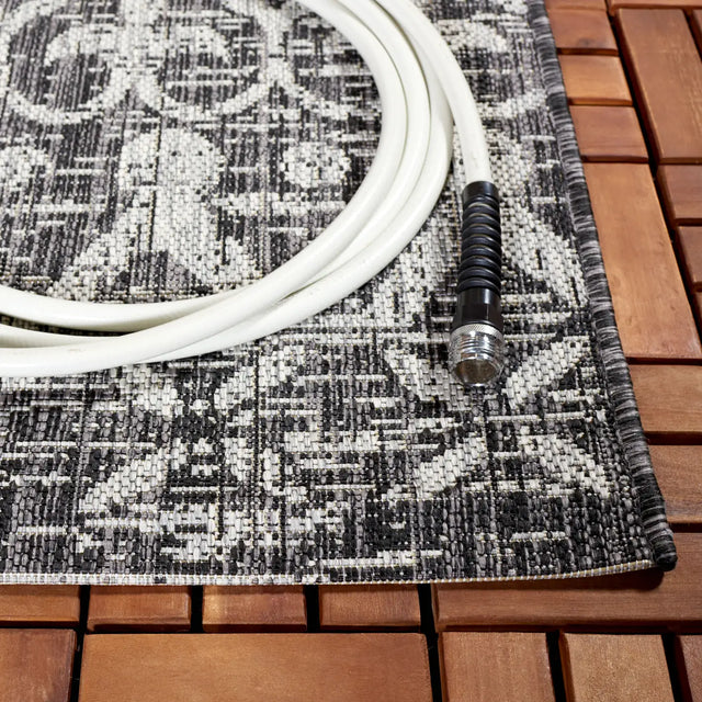 Safavieh Courtyard 6'-7" x 9'-6" Rug in Black / Grey