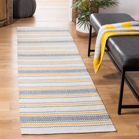 Safavieh Montauk 2'-3" x 8'-0" Rug in Gold / Beige