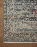 Loloi Heritage Her-09 Sky/Sunset Rug - corner on wood