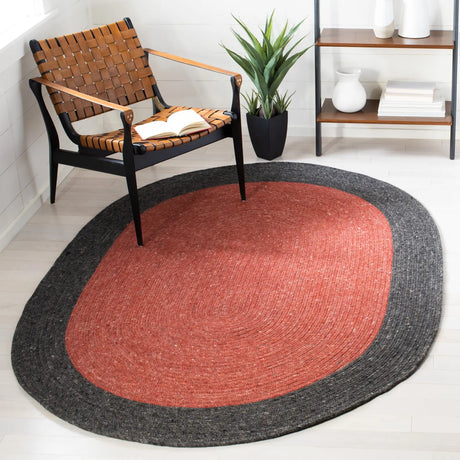 Safavieh Braided 5'-0" x 7'-0" Rug in Red / Black