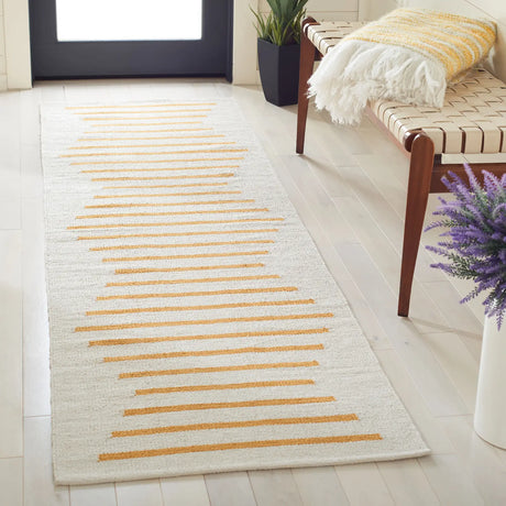 Safavieh Montauk 2'-3" x 8'-0" Rug in Ivory / Gold