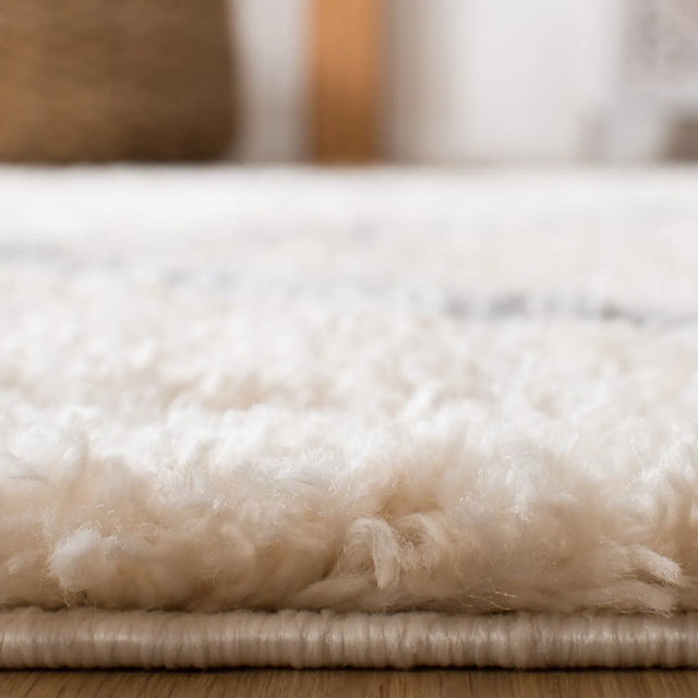 Safavieh Berber Fringe Shag 5'-3" x 7'-6" Rug in Cream / Grey