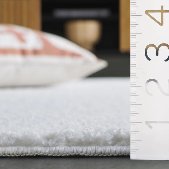 Safavieh Boucle 100 5'-0" x 7'-0" Rug in Ivory