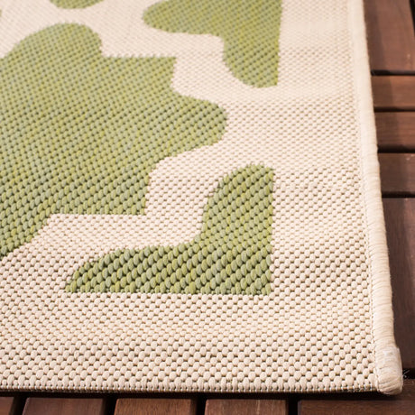 Safavieh Courtyard 6'-7" x 9'-6" Rug in Green / Beige