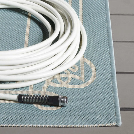 Safavieh Courtyard 4'-0" x 5'-7" Rug in Aqua / Cream