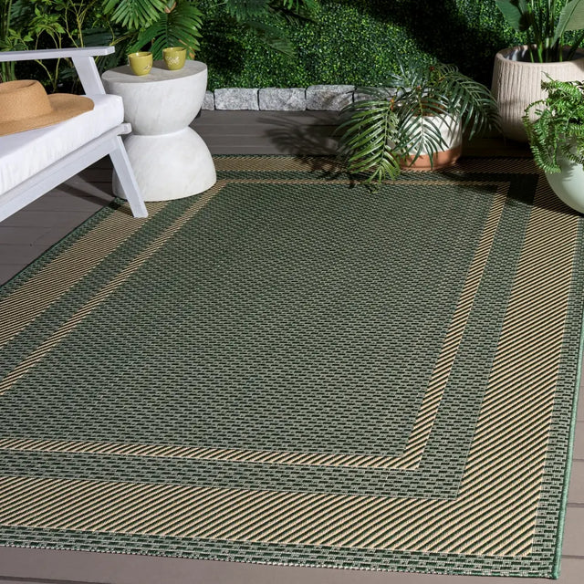 Safavieh Courtyard 5'-3" x 7'-7" Rug in Green / Beige