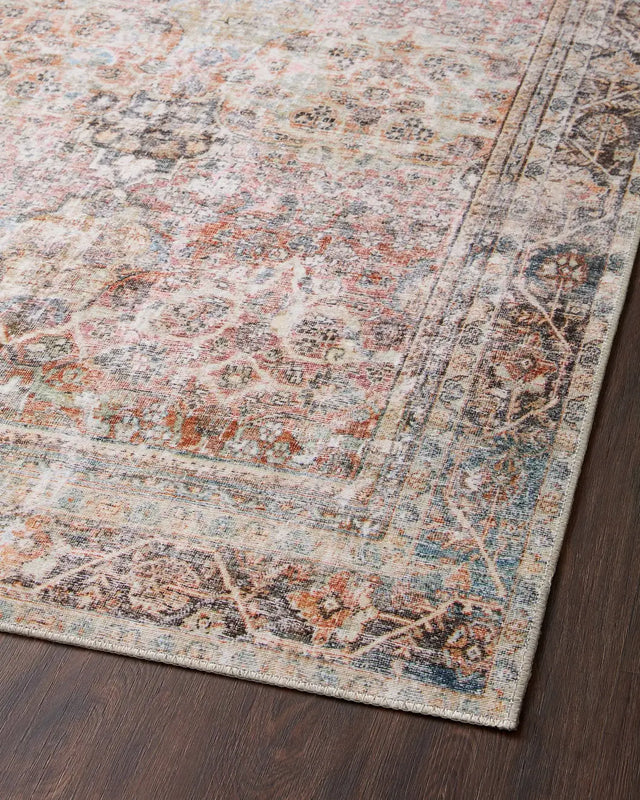 Loloi Adrian Adr-05 Sunset/Charcoal Rug - angled corner on wood