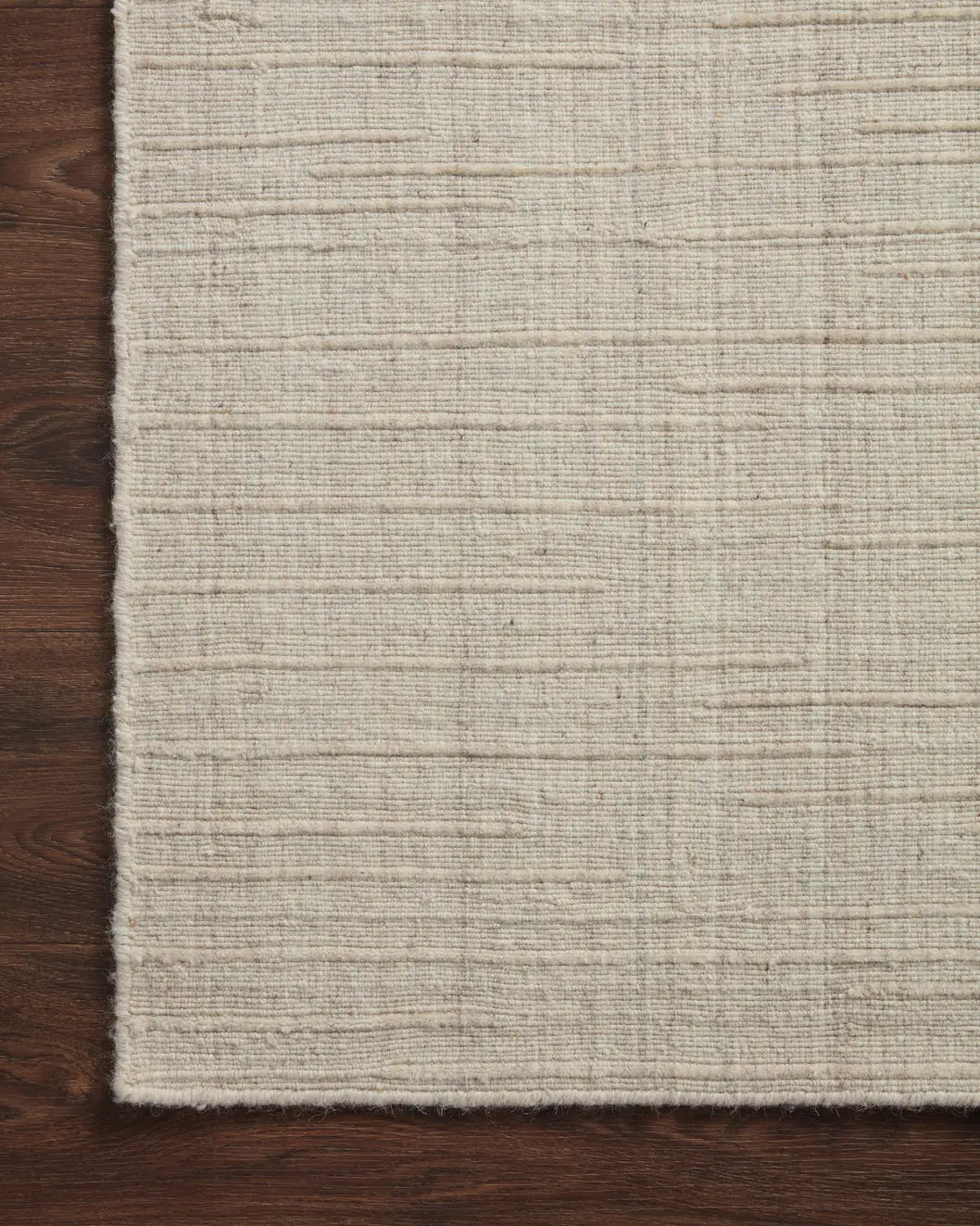 Loloi Brooks Bro-01 Stone Rug - corner on wood