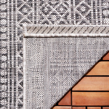 Safavieh Courtyard 5'-3" x 7'-7" Rug in Black / Beige
