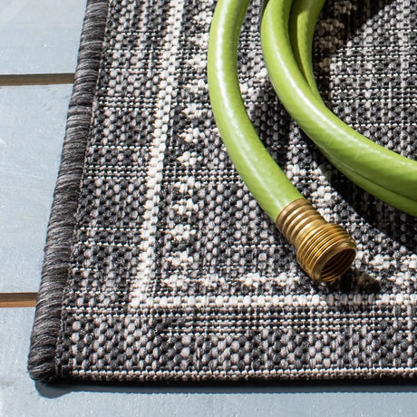 Safavieh Courtyard 4'-5" x 6'-5" Rug in Black / Grey