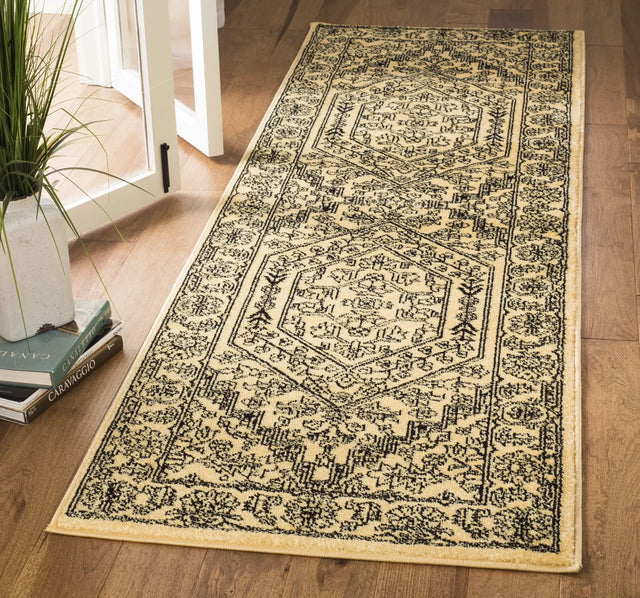 Safavieh Adirondack 2'-6" x 10'-0" Rug in Gold / Black