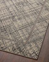 Loloi Rainier Rai-10 Ivory/Charcoal Rug - angled corner on wood