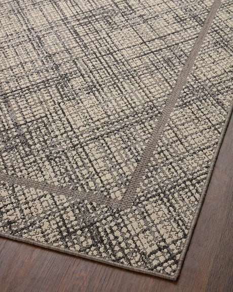 Loloi Rainier Rai-10 Ivory/Charcoal Rug - angled corner on wood