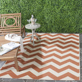 Safavieh Courtyard 5'-3" x 7'-7" Rug in Terracotta / Beige
