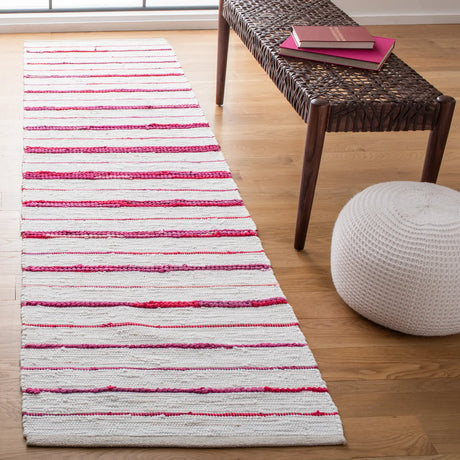 Safavieh Montauk 2'-3" x 9'-0" Rug in Red / Ivory
