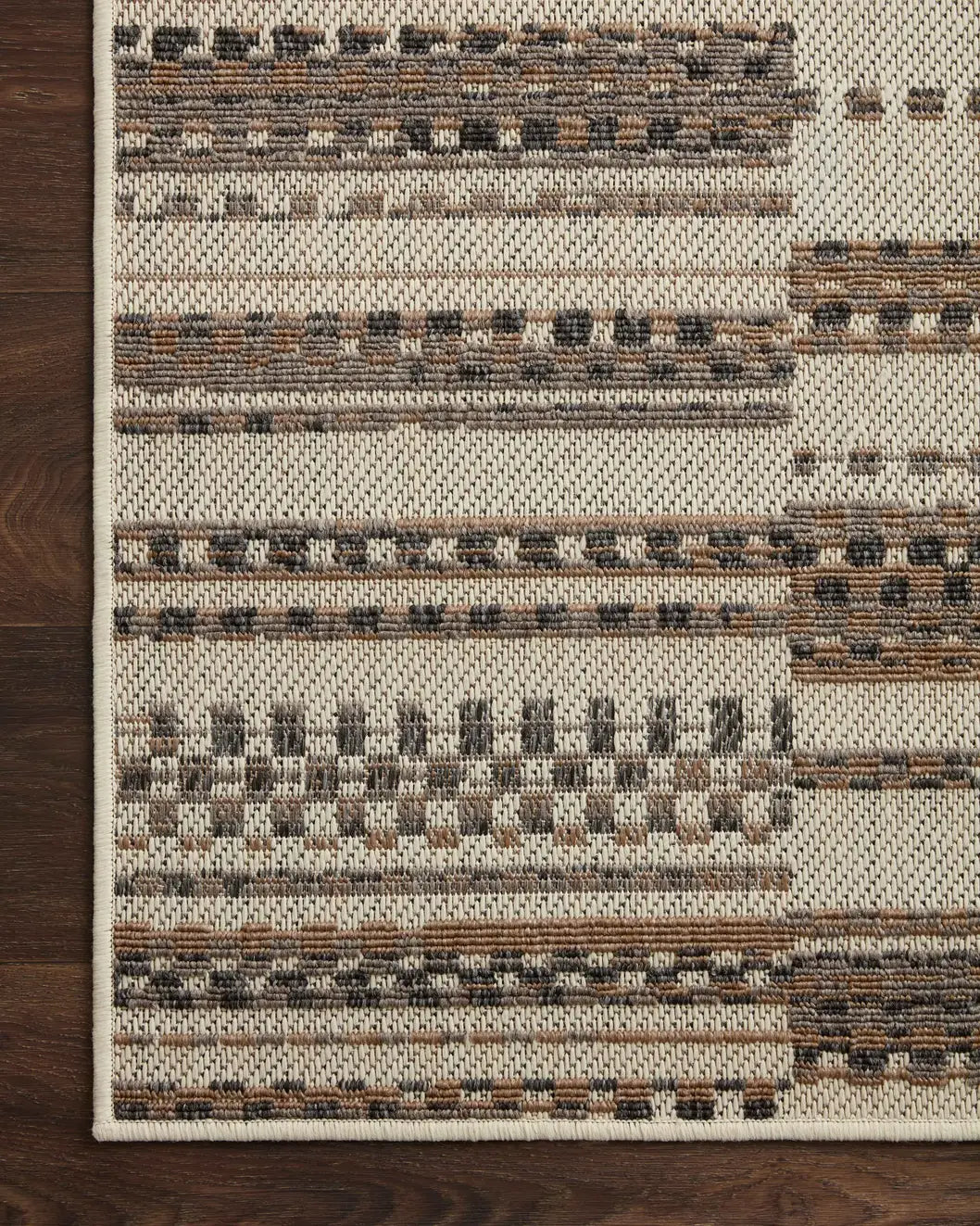 Loloi Rainier Rai-08 Ivory/Taupe Rug - corner on wood