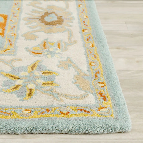 Safavieh Heritage 6'-0" x 9'-0" Rug in Light Blue / Ivory