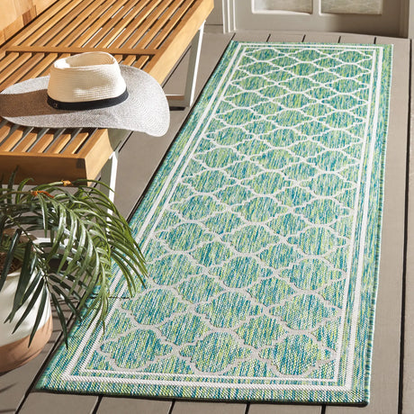 Safavieh Courtyard 2'-3" x 8'-0" Rug in Green / Ivory