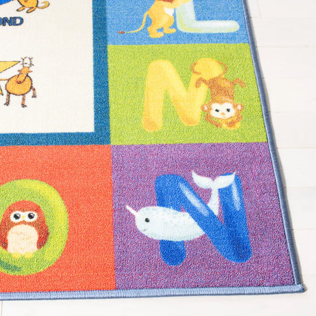Safavieh Kids Playhouse 200 5'-5" x 7'-7" Rug in Beige / Blue