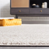 Safavieh Jade 100 4'-0" x 6'-0" Rug in Beige / Ivory