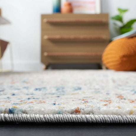 Safavieh Aston 4'-0" x 6'-0" Rug in Ivory / Navy
