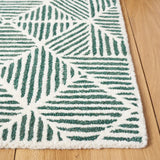 Safavieh Abstract 4'-0" x 6'-0" Rug in Dark Green / Ivory