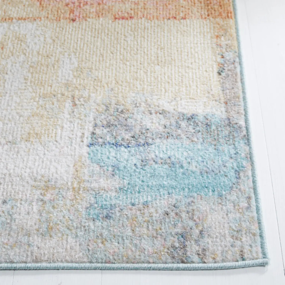 Safavieh Phoenix 500 4'-5" x 6'-5" Rug in Rust Blue / Ivory