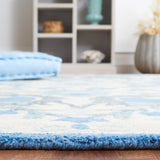 Safavieh Antiquity 4'-0" x 6'-0" Rug in Ivory / Blue
