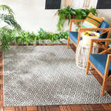 Safavieh Courtyard 5'-3" x 7'-7" Rug in Beige / Black