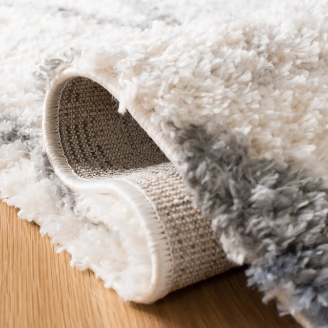 Safavieh Berber Fringe Shag 4'-0" x 6'-0" Rug in Cream / Blue