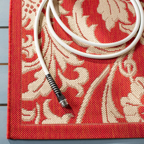 Safavieh Courtyard 5'-3" x 7'-7" Rug in Red / Creme