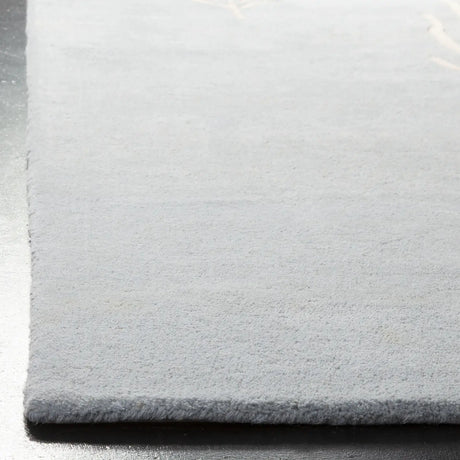 Safavieh Soho 3'-6" x 5'-6" Rug in Light Blue / Ivory