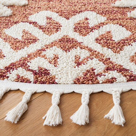Safavieh Moroccan Tassel Shag 6'-7" x 6'-7" Rug in Orange / Ivory