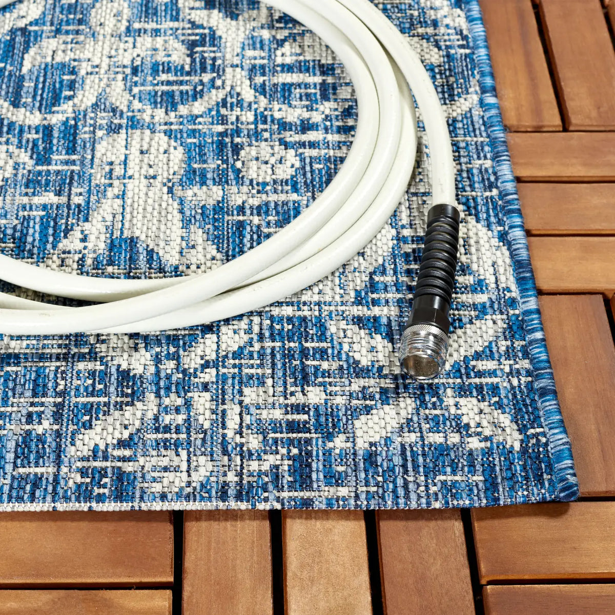 Safavieh Courtyard 6'-7" x 9'-6" Rug in Navy / Grey