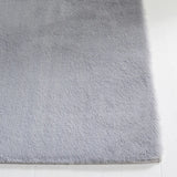 Safavieh Faux Rabbit Fur 5'-0" x 7'-0" Rug in Light Grey