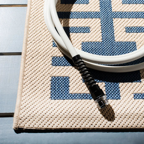 Safavieh Courtyard 6'-7" x 9'-6" Rug in Blue / Beige