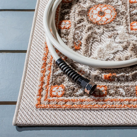 Safavieh Cabana 4'-5" x 6'-5" Rug in Beige / Orange
