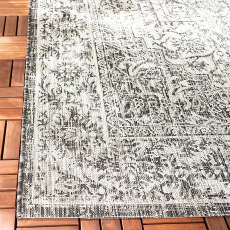 Safavieh Courtyard 5'-3" x 7'-7" Rug in Slate / Grey