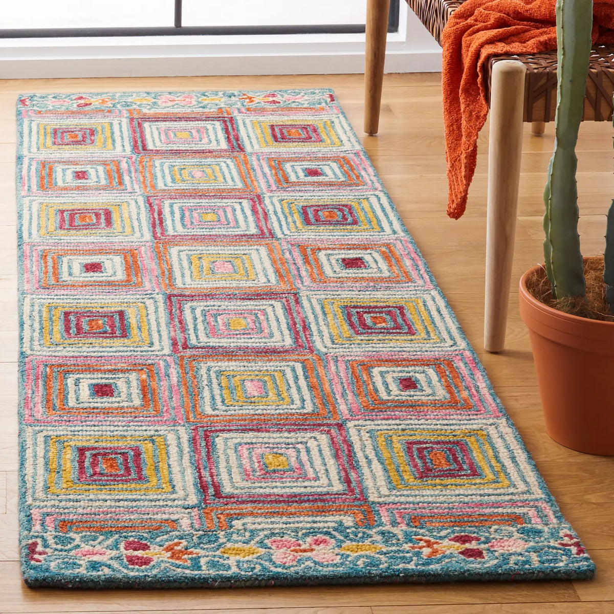 Safavieh Aspen 2'-3" x 7'-0" Rug in Pink / Gold