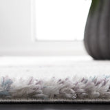 Safavieh Berber Shag 4'-5" x 6'-5" Rug in Blue Rust / Ivory