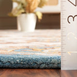 Safavieh Heritage 4'-0" x 6'-0" Rug in Beige / Ivory