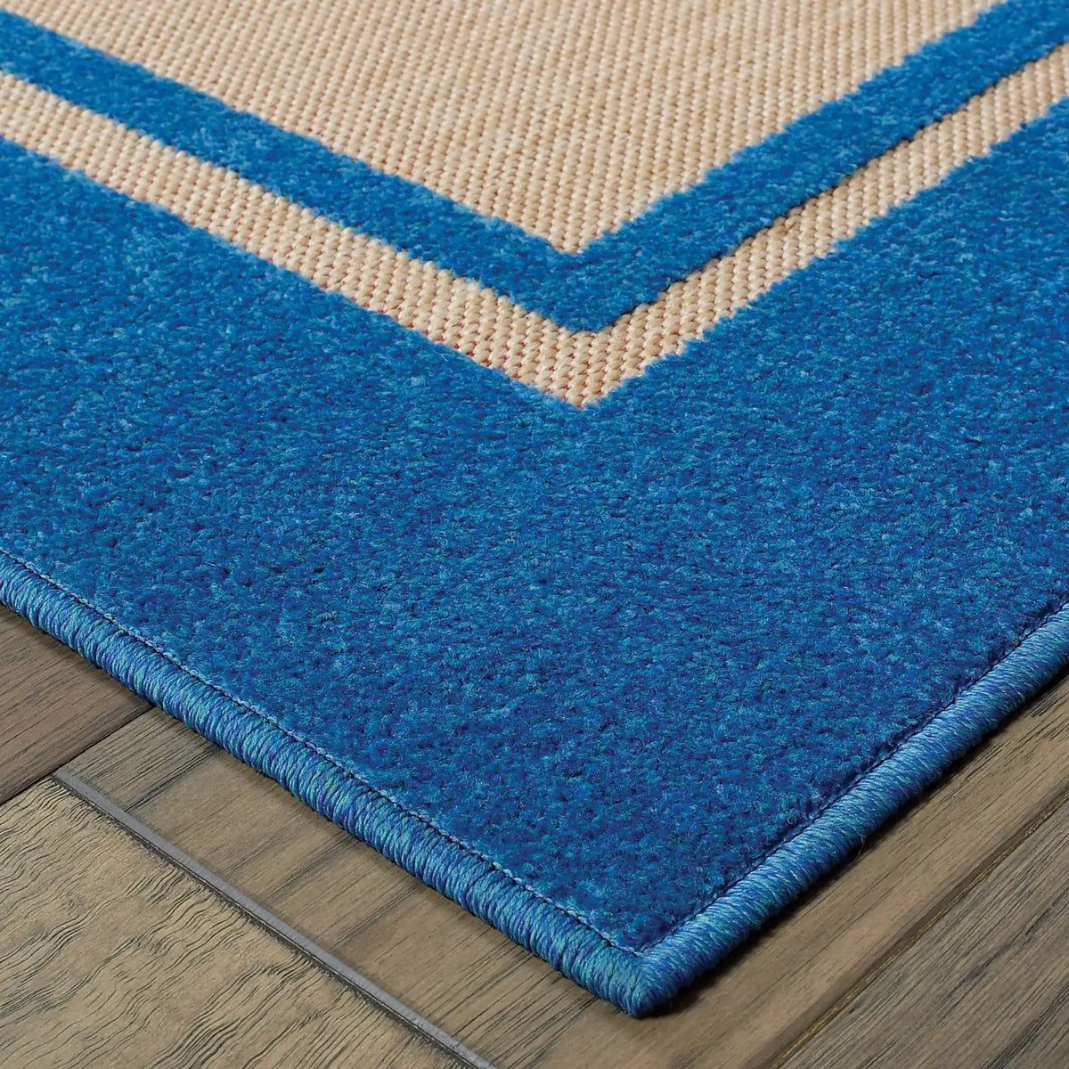 Oriental Weavers Sphinx Cayman 5594B Sand / Blue Rugs - corner detail